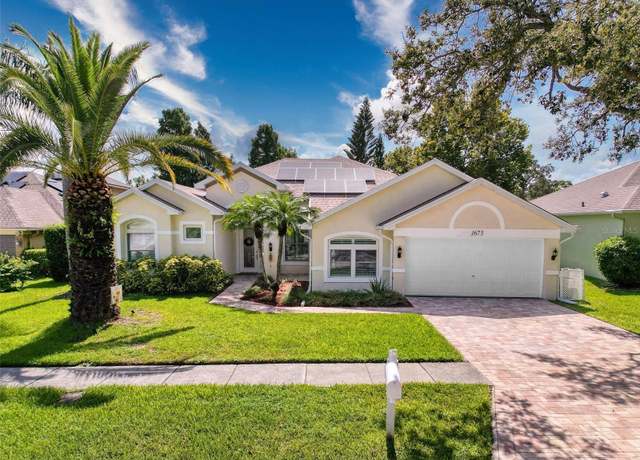 Property at 1673 Oak Park Ct, Tarpon Springs, FL 34689, 4 beds, 3 baths