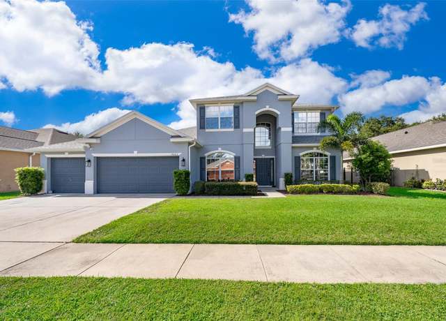 Property at 7263 Winding Lake Cir, Oviedo, FL 32765, 5 beds, 3 baths