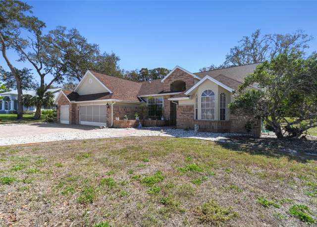 Property at 18739 Bascomb Ln, Hudson, FL 34667, 4 beds, 3 baths