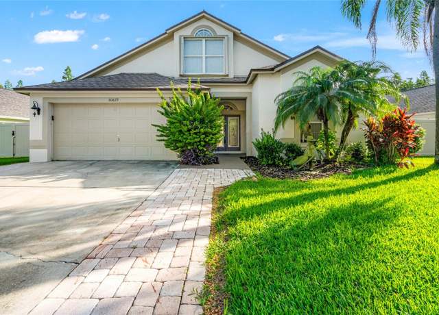 Property at 30829 Iverson Dr, Wesley Chapel, FL 33543, 4 beds, 2 baths