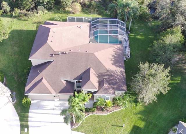 Property at 10411 Riverburn Dr, Tampa, FL 33647, 5 beds, 4 baths