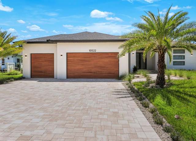 Property at 10522 Riverside Rd, Port Charlotte, FL 33981, 4 beds, 3 baths