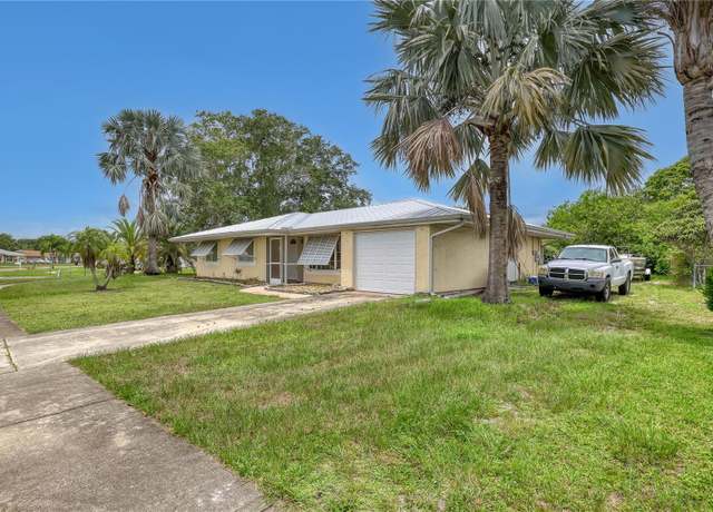 Property at 1340 NE Mariposa Dr NE, Palm Bay, FL 32905, 3 beds, 2 baths