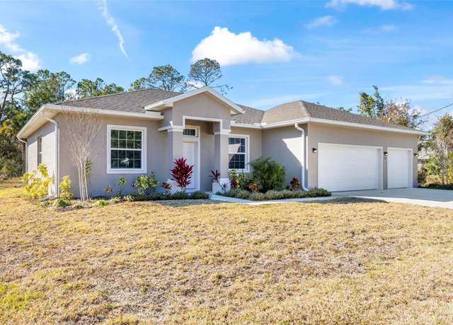 Property at 63 Whispering Pine Dr, Palm Coast, FL 32164, 3 beds, 2 baths