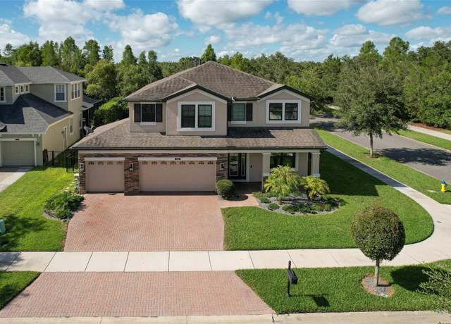 Property at 8742 Handel Loop, Land O Lakes, FL 34637, 5 beds, 3 baths