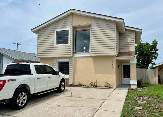 Property at 10513 Parkcrest Dr, Tampa, FL 33624, 4 beds, 2.5 baths