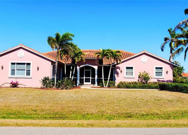 Property at 8233 Burwell Cir, Port Charlotte, FL 33981, 4 beds, 3 baths