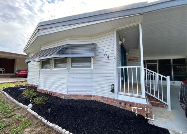 Property at 164 Royal Palm Dr, Leesburg, FL 34748, 2 beds, 2 baths