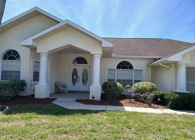 Property at 8630 NE Coral Creek Loop, Hudson, FL 34667, 3 beds, 2 baths