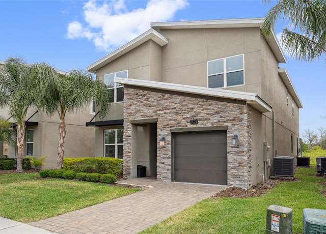 Property at 721 Drop Shot Dr, Davenport, FL 33896, 5 beds, 5 baths