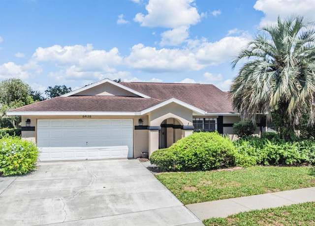 Property at 6436 Huntington Dr, Zephyrhills, FL 33542, 4 beds, 3 baths