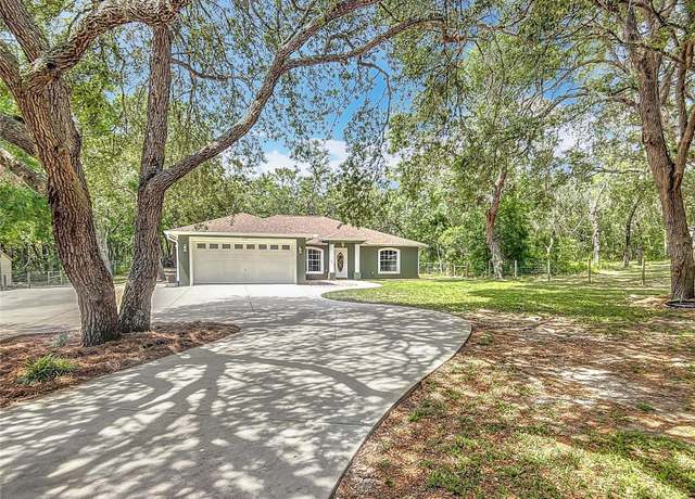 Property at 1199 E Mckinley St, Hernando, FL 34442, 4 beds, 2 baths