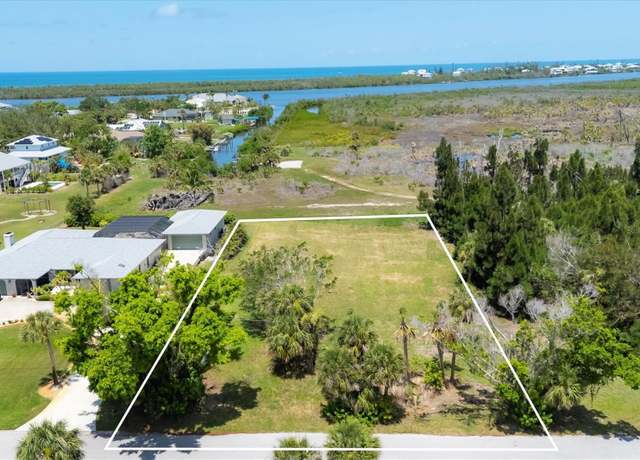 Property at 85 Green Dolphin Dr N, Placida, FL 33946