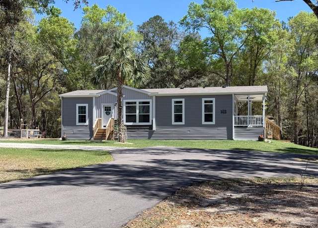 Property at 16378 Wild Azalea Ln, Brooksville, FL 34601, 3 beds, 2 baths