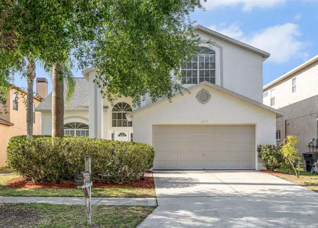 Property at 27330 Coral Springs Dr, Wesley Chapel, FL 33544, 4 beds, 2.5 baths