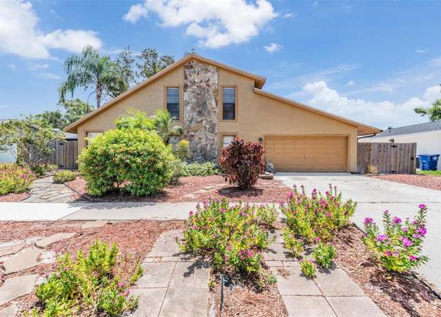 Property at 1400 Wexford Dr S, Palm Harbor, FL 34683, 4 beds, 2.5 baths