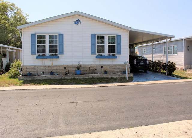 Property at 51 Pindo Palm St E, Largo, FL 33770, 3 beds, 2 baths