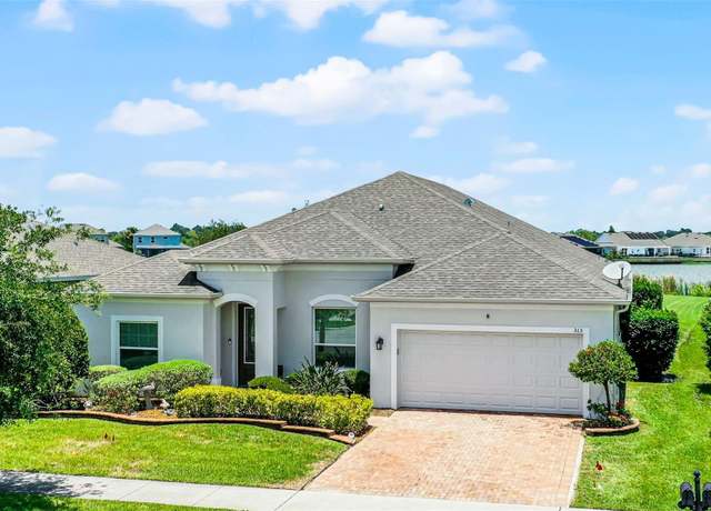 Property at 313 Blue Cypress Dr, Groveland, FL 34736, 4 beds, 3.5 baths