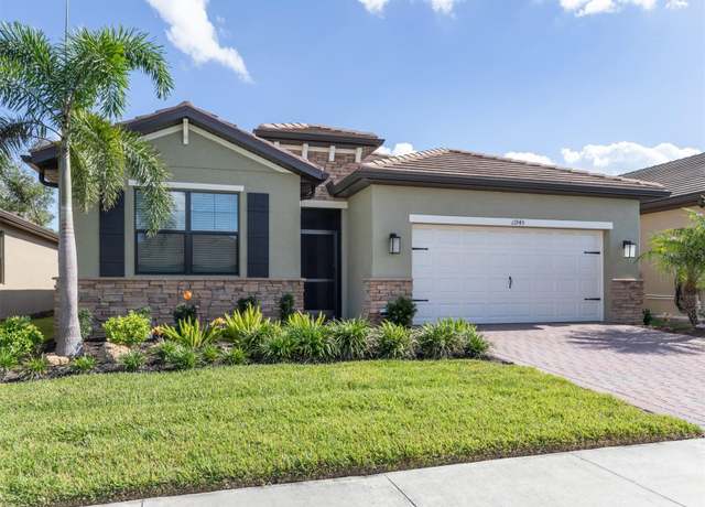 Property at 11945 Lovegrass St, Venice, FL 34293, 4 beds, 2 baths