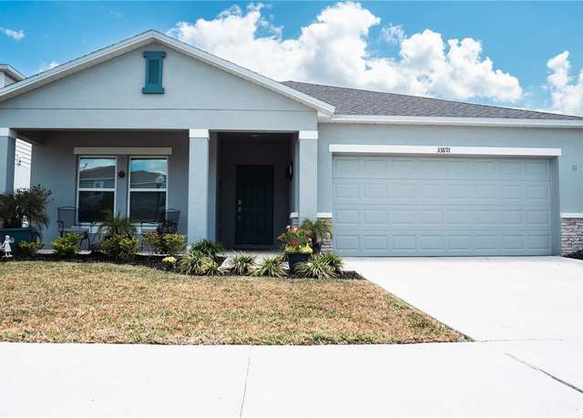 Property at 33891 Sky Blossom Cir, Leesburg, FL 34788, 4 beds, 3 baths