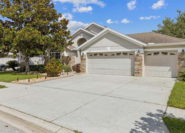 Property at 6935 Runner Oak Dr, Wesley Chapel, FL 33545, 4 beds, 2 baths