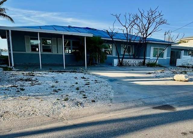 Property at 1310 Boca Ciega Isle Dr, St Pete Beach, FL 33706, 3 beds, 2.5 baths