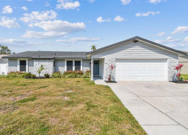 Property at 507 Hammock Dr, Palm Harbor, FL 34683, 4 beds, 3 baths