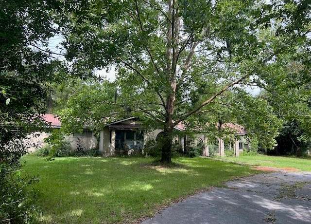 Property at 3231 NE Hwy 41, Williston, FL 32696, 4 beds, 4 baths