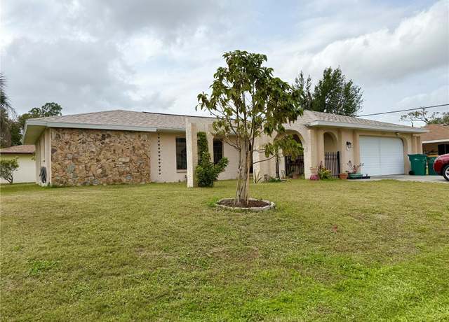 Property at 1469 Inverness St, Port Charlotte, FL 33952, 3 beds, 2 baths