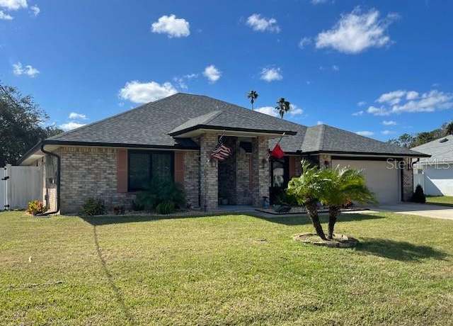 Property at 129 Fort Caroline Ln, Palm Coast, FL 32137, 4 beds, 3 baths