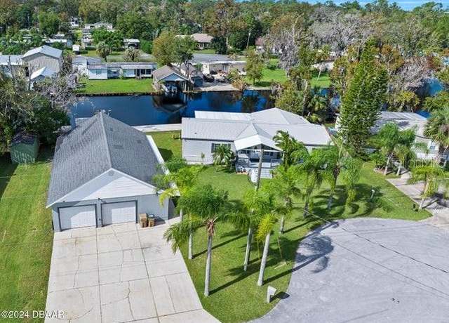Property at 55805 Carroll St, Astor, FL 32102, 3 beds, 3.5 baths