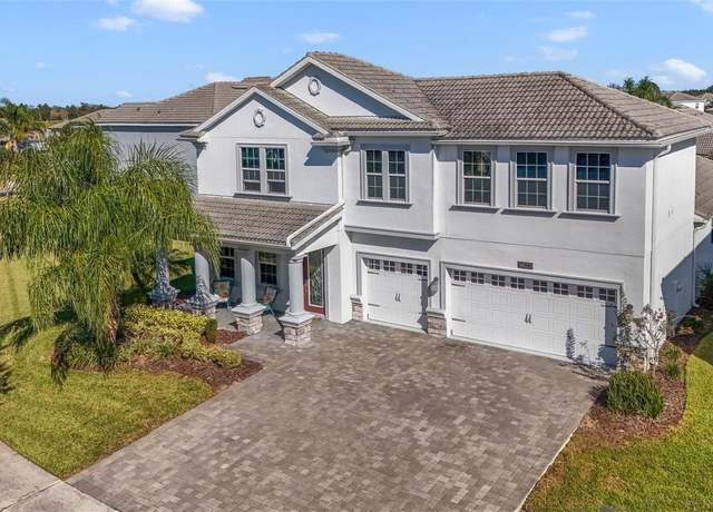 Property at 1402 Olympic Club Blvd, Champions Gate, FL 33896, 4 beds, 3.5 baths