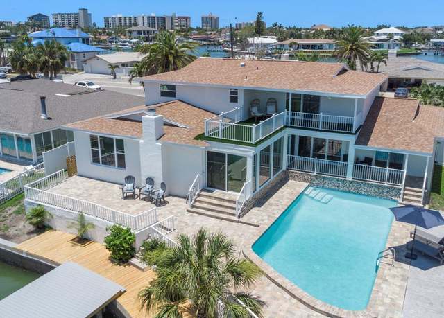 Property at 451 Palm Is NE, Clearwater Beach, FL 33767, 5 beds, 4 baths