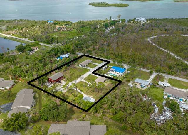 Property at 7500 Beckers Ln, Englewood, FL 34224, 9 beds, 7 baths