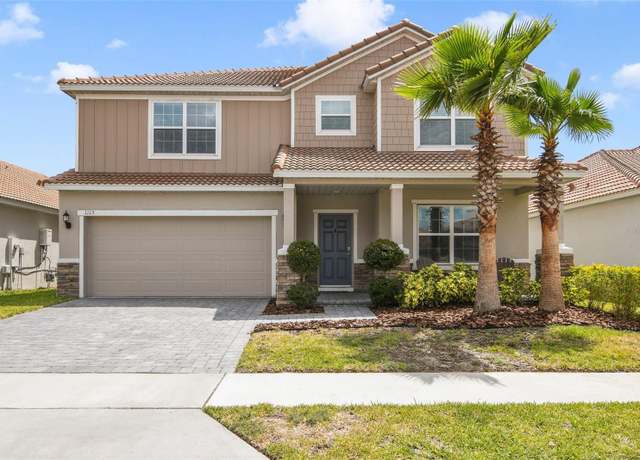 Property at 1115 Oak Bluff Dr, Davenport, FL 33837, 5 beds, 3.5 baths