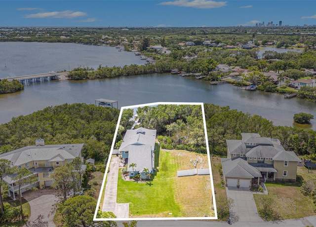 Property at 734 Weedon Dr NE, St Petersburg, FL 33702, 4 beds, 3 baths