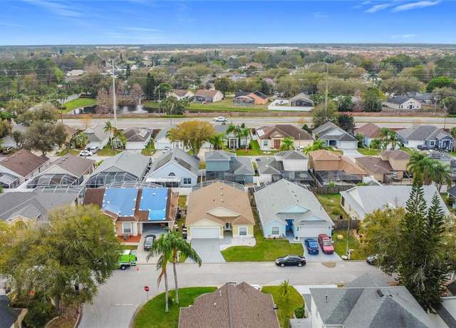 Property at 458 Hollinghead Loop, Davenport, FL 33896, 4 beds, 2 baths
