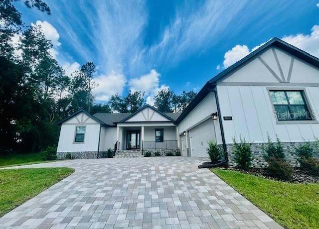 Property at 4000 Southern Valley Loop, Brooksville, FL 34601, 4 beds, 3.5 baths