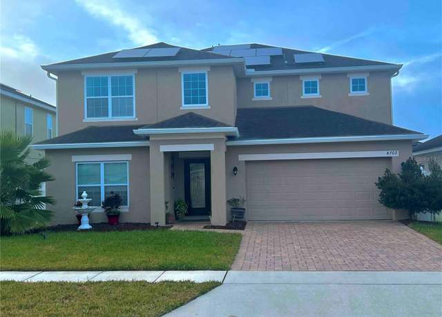 Property at 4702 Greycliff Prairie Dr, Kissimmee, FL 34758, 5 beds, 3.5 baths