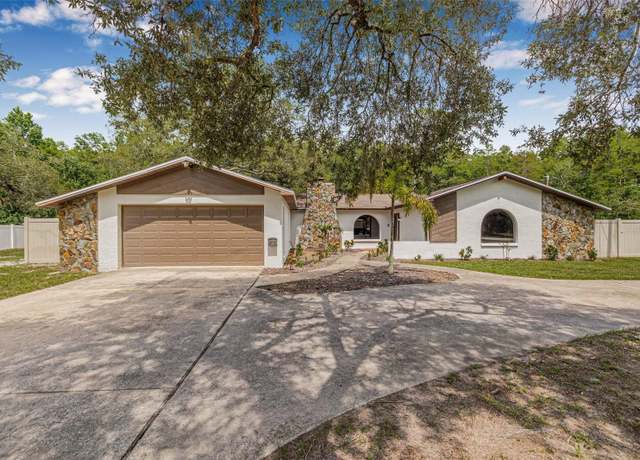 Property at 10430 Bobcat Dr, New Port Richey, FL 34654, 4 beds, 2 baths