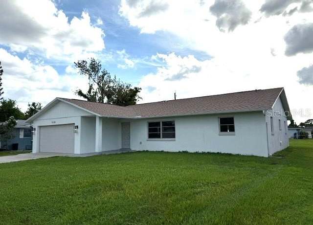 Property at 3125 Port Charlotte Blvd, Port Charlotte, FL 33952, 3 beds, 2 baths