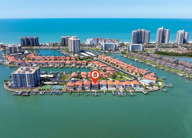 Property at 218 Sand Key Estates Dr, Clearwater Beach, FL 33767, 4 beds, 4.5 baths