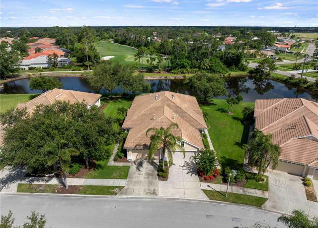 Property at 5057 Whispering Oaks Dr, North Port, FL 34287, 2 beds, 2 baths