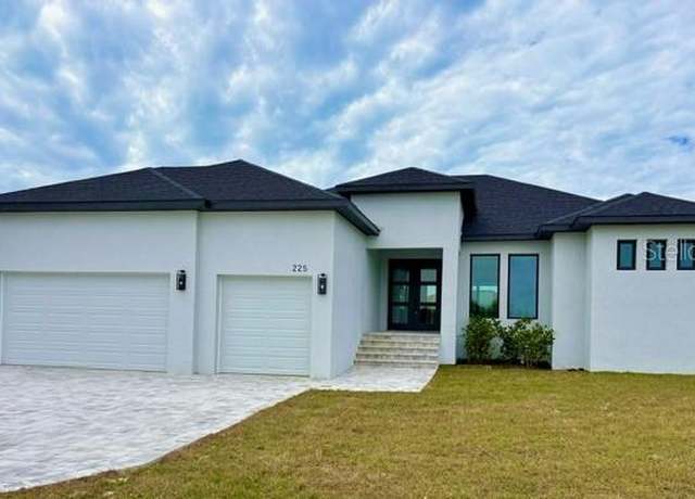 Property at 225 Tournament Rd, Rotonda West, FL 33947, 3 beds, 3.5 baths
