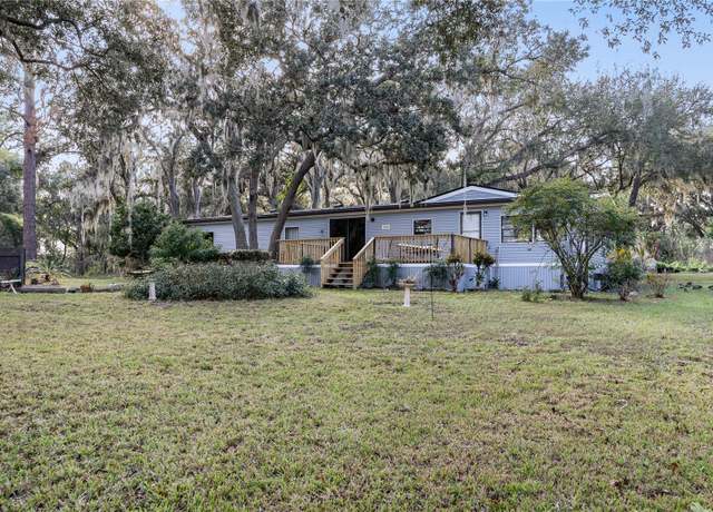 Property at 33250 Irongate Dr, Leesburg, FL 34788, 4 beds, 2.5 baths