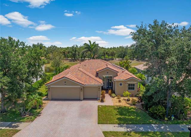 Property at 11982 Granite Woods Loop, Venice, FL 34292, 4 beds, 3 baths