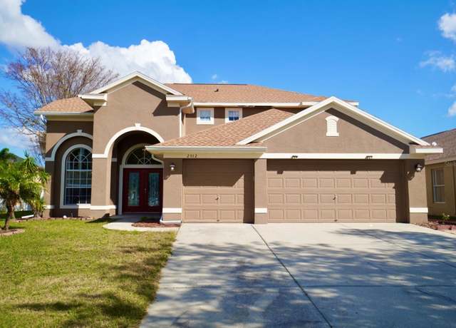 Property at 2012 Fern Ridge Ct, Holiday, FL 34691, 4 beds, 3 baths