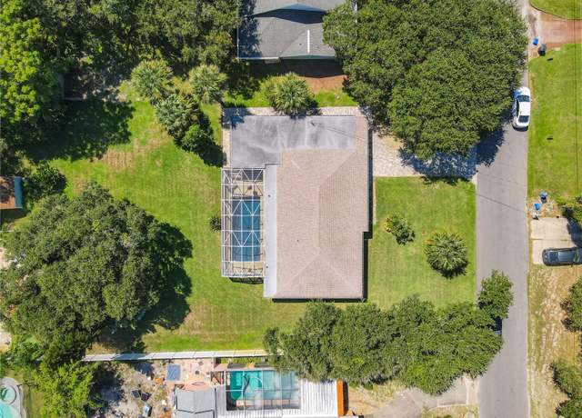 Property at 813 E 13th Ave, New Smyrna Beach, FL 32169, 4 beds, 2 baths