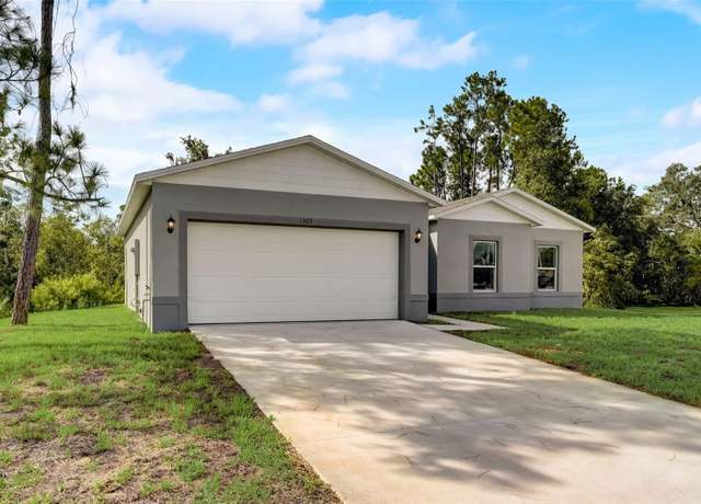 Property at 166 Fremont Ave S, Lehigh Acres, FL 33974, 3 beds, 2.5 baths