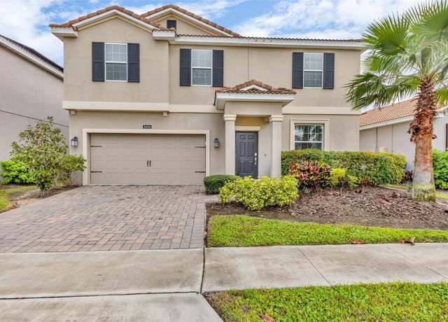 Property at 1616 Oak Blossom Dr, Davenport, FL 33837, 4 beds, 2.5 baths